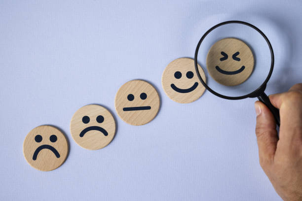 istock Service Excellence: A Customer's Happy Finger Pressing the Blue Button to Rate 2162485769