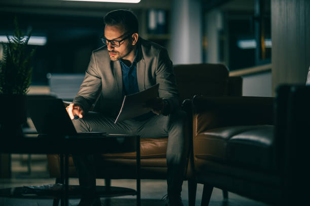 istock Businessman at work at night 2162488554