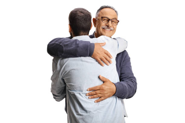 istock Happy men greeting each other with a hug 2162489341