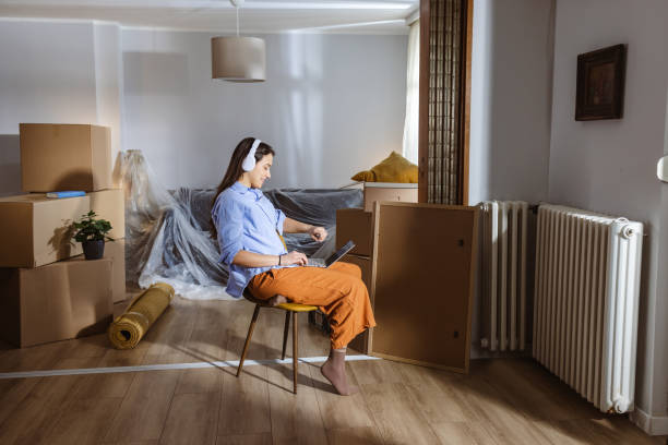 istock Working on laptop in my new home 2162499209