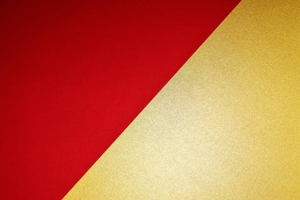 istock Gold and red paper background 2162502521