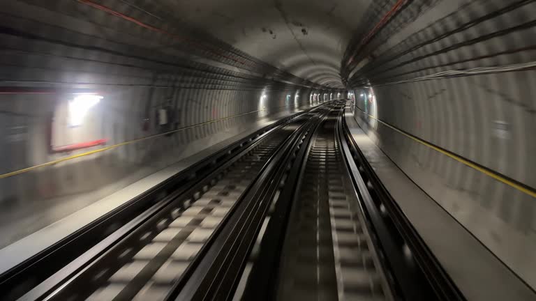 4K. Time lapse automatic train subway tunnel fast speed. Metro subway with a tunnel and a train moving fast. Tube lines in the tunnel. 4K.Time lapse automatic train subway tunnel fast speed