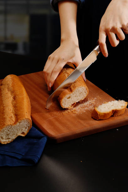 istock Kitchen chopping knife cutting on wooden chopping board 2162507702