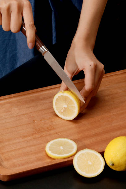 istock Kitchen chopping knife cutting on wooden chopping board 2162507706