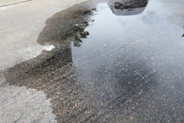 istock reflect on water and wet floor 2162508644