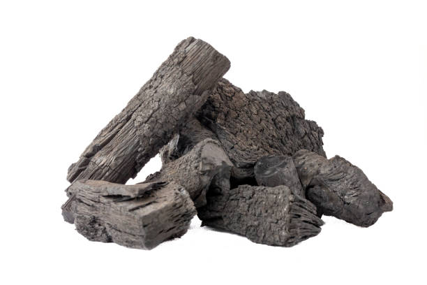 istock Stack of charcoal logs isolated on white background. 2162510729