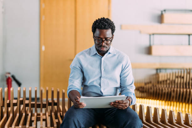 Businessman reading document in the office.