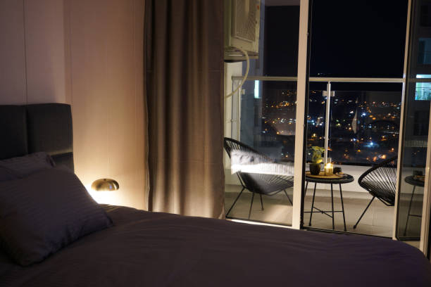 istock modern luxury bedroom with balcony, photo at night 2162517529