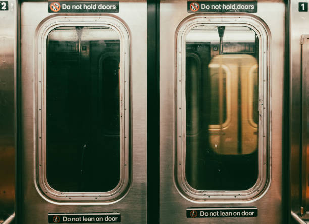 New York subway doors and a moving train on the background