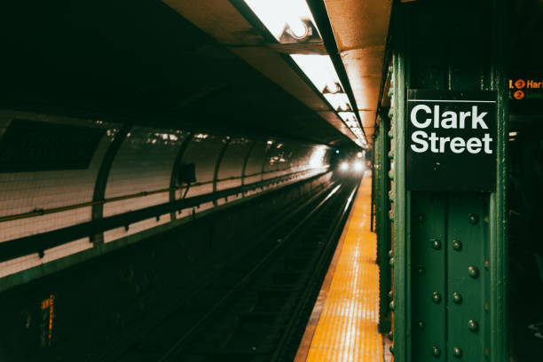 istock Train approaching clark street subway station in New York 2162519094