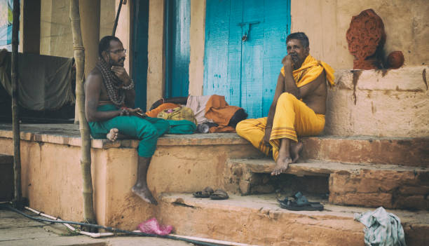 Varanasi, India. 29th october 2017. Two men sitting in a Gath in the city of Varanasi.
