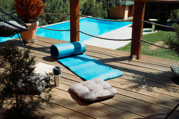 3d rendering of swimming pool blue sky background, summer holiday travel concept.