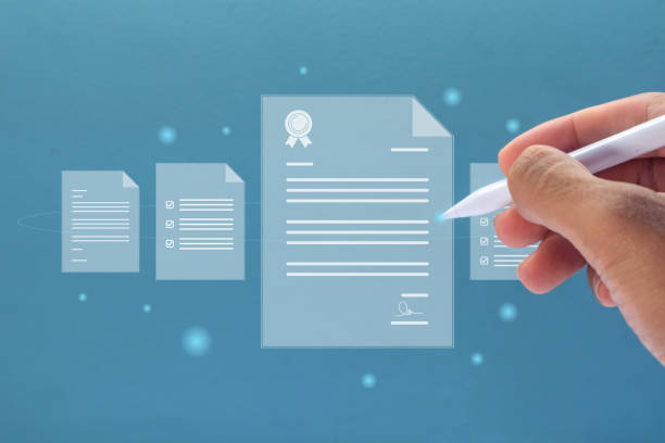 istock Hand holding a pen with virtual screen of document. Digital document management and signing business contract concept. 2162523027