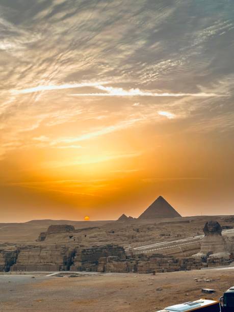 Egypt Cairo Pyramid, tourists at sunset