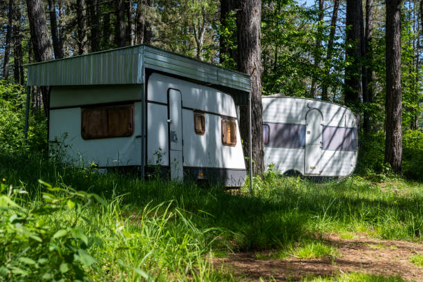 istock Abandoned camping trailers in the forest on Lake Vlasina. 2162525444