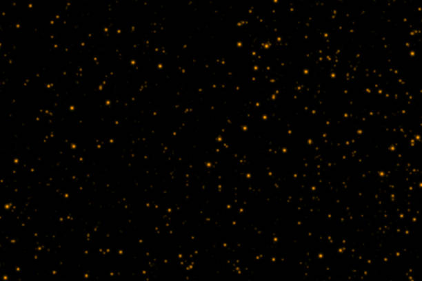 istock Gold specks, scratches on a black background 2162529021