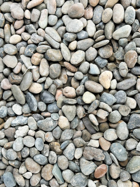 istock Texture pattern of pebbles gravel and small stones in walk way 2162533057
