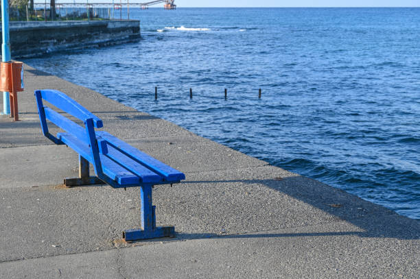 istock blue bench embankment in Cyprus 2 2162534710