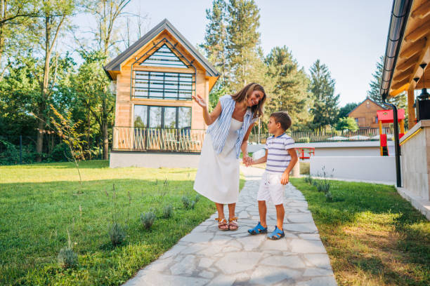 istock mom and son Enjoying a Walk on Vacation . 2162537642