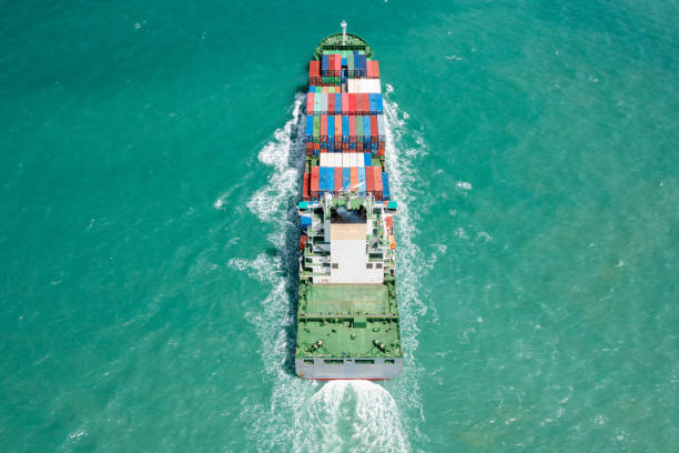 istock Cargo Ship with Colorful Containers at Sea 2162542052