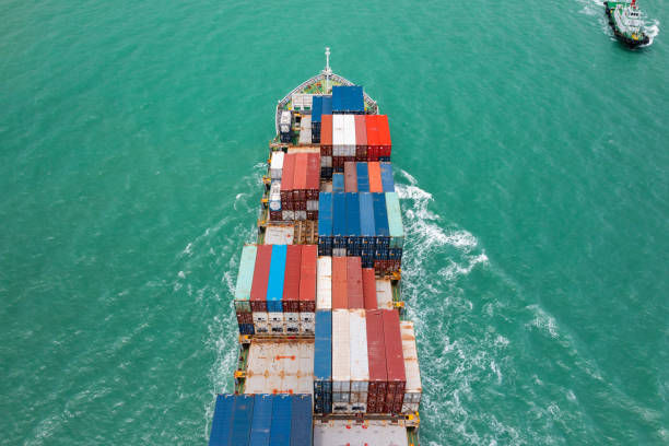 istock Cargo Ship with Colorful Containers at Sea 2162542065