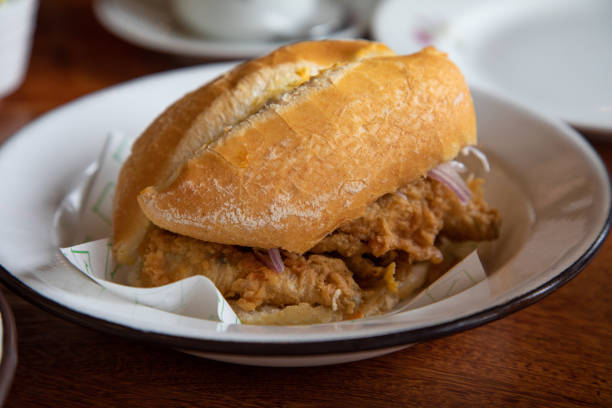 istock Fried fish pejerrey sandwich Peruvian breakfast food table 2162542571