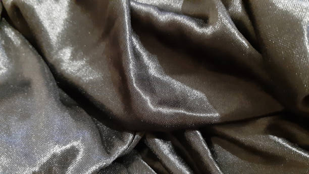 istock Black, dark, satin, shiny surface. Background design, photography. Textile, fabric template,  modern 2162546198