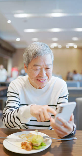 istock elder man use smart phone 2162549696