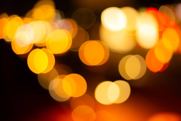 istock bokeh lights background,Red glitter vintage lights background. defocused. 2162551056