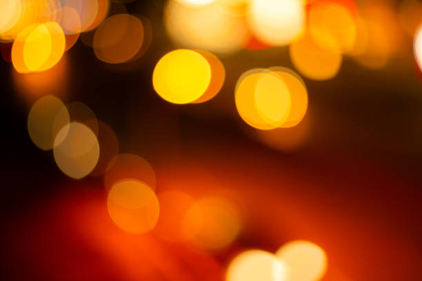 istock bokeh lights background,Red glitter vintage lights background. defocused. 2162551065