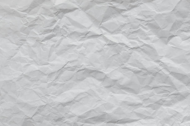 istock Crumpled white paper texture. Old sheet of paper with cracks 2162551081