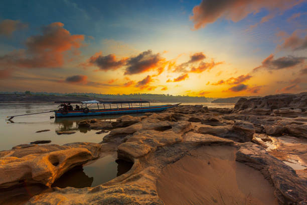 Ubon Ratchathani,Sunrise landscape photo with boat, mountain,Sam Phan Bok, Ubon Ratchathani, Thailand