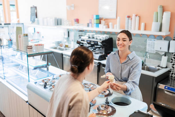 istock Young Woman Picking Her Favorite Ice Cream 2162554845