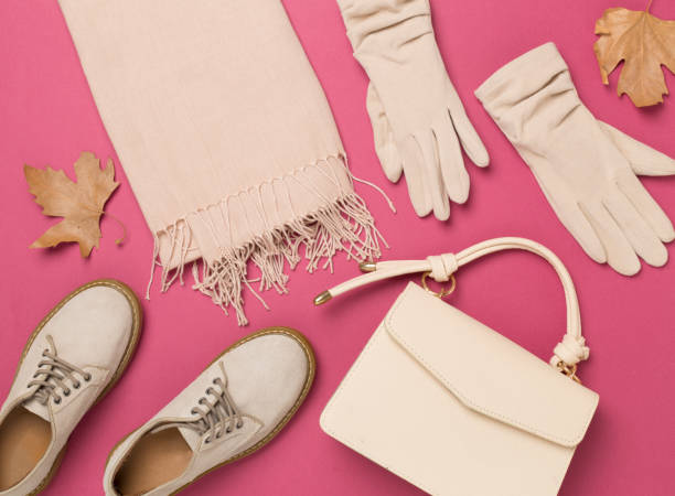 istock Stylish autumn accessories on color background, top view 2162555168