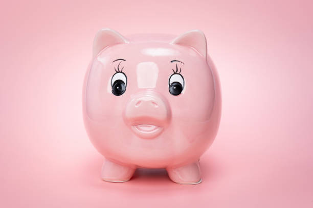 Une tire-lire en forme de petit cochon rose