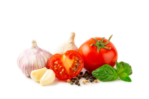 istock Fresh cherry tomatoes and fresh green basil on a textured background. Tomato sauce. Vegan. Ingredients for salad. Organic food. Place for text. Copy space. 2162559309