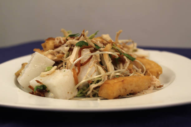 istock Indonesian dish Tahoe Lontong on white plate 2162561307