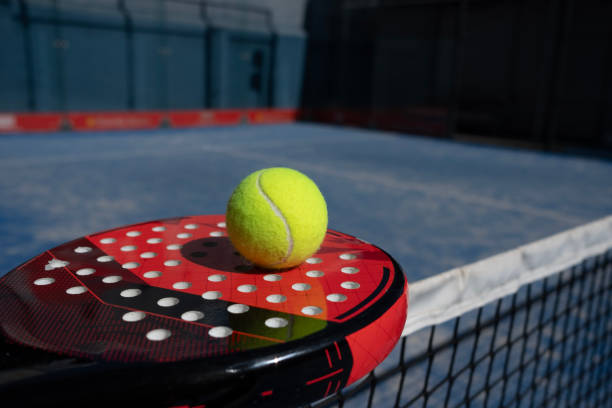 Single Tennis ball on a blue artificial grass court where lines meet, Melbourne, Australia 2015