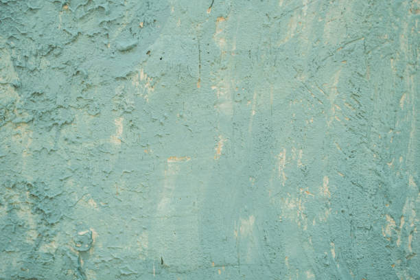 textured wall background in turquoise color