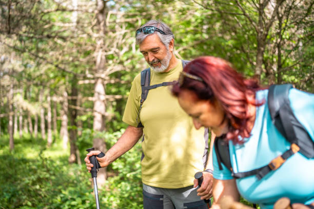istock Active Senior Couple on a Hiking Adventure in Nature 2162572928