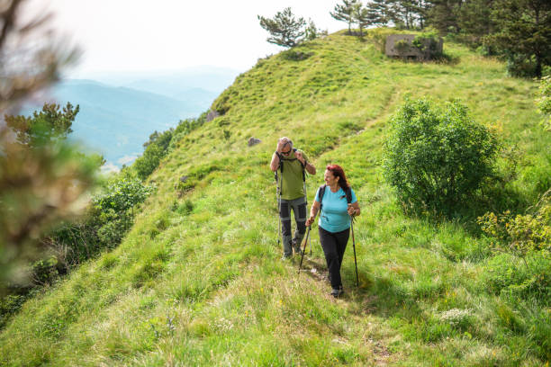istock Senior Couple Enjoying Hike in Nature 2162572951