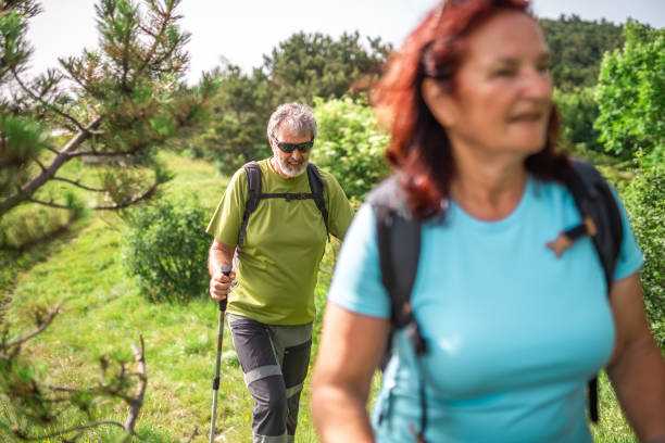 istock Senior Couple Enjoying Nature Walk 2162572959