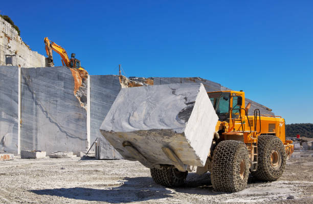 istock Bulldozer in Marble Quarry 2162574750