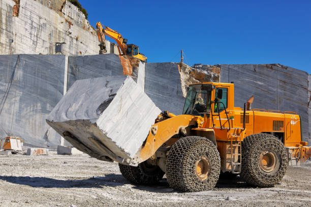 istock Bulldozer in Marble Quarry 2162574753