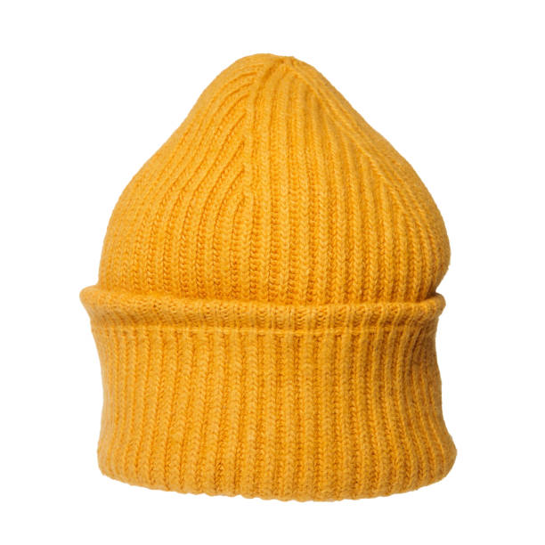 istock Bright orange knitted hat close-up. A warm and stylish accessory with an expressive texture, ideal for the cold 2162576620