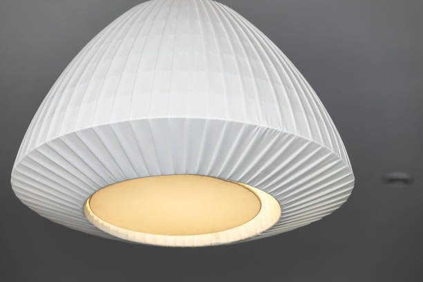 istock Modern chandelier with white round lamp shade 2162576822