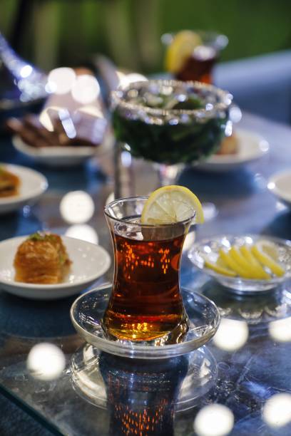 istock Turkish Tea With Lemon on a Glass Table 2162585450