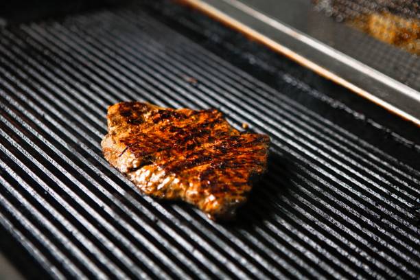 istock Grilled Steak on Black Grill 2162586931