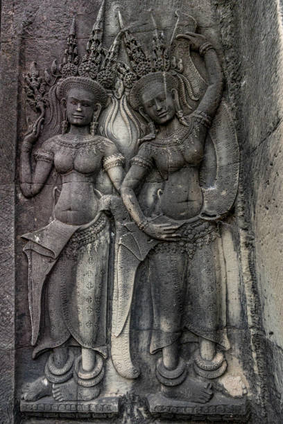 Ancient soldier bas-relief on a wall at Banteay Kdei temple ruins, in Angkor Wat complex near Siem Reap, Cambodia.