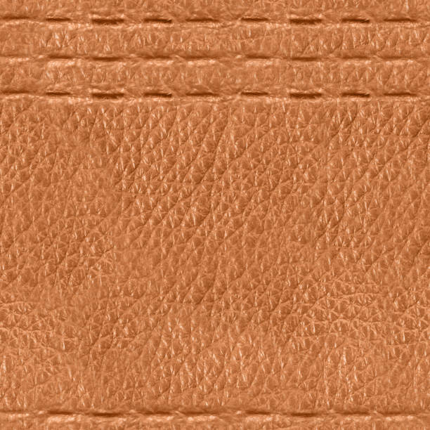 istock Seamless 4k photo texture of light brown leather embossed with stitch line pattern. 2162592493